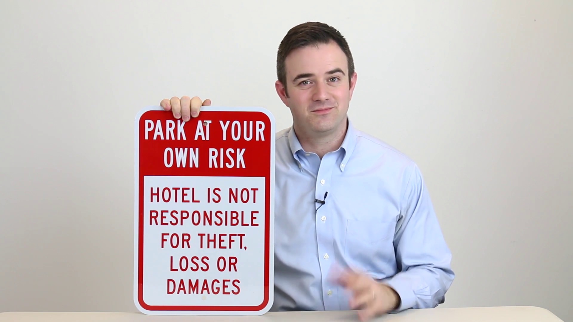 Park At Your Own Risk Hotel Not Responsible For Theft, Loss Or Damages Sign