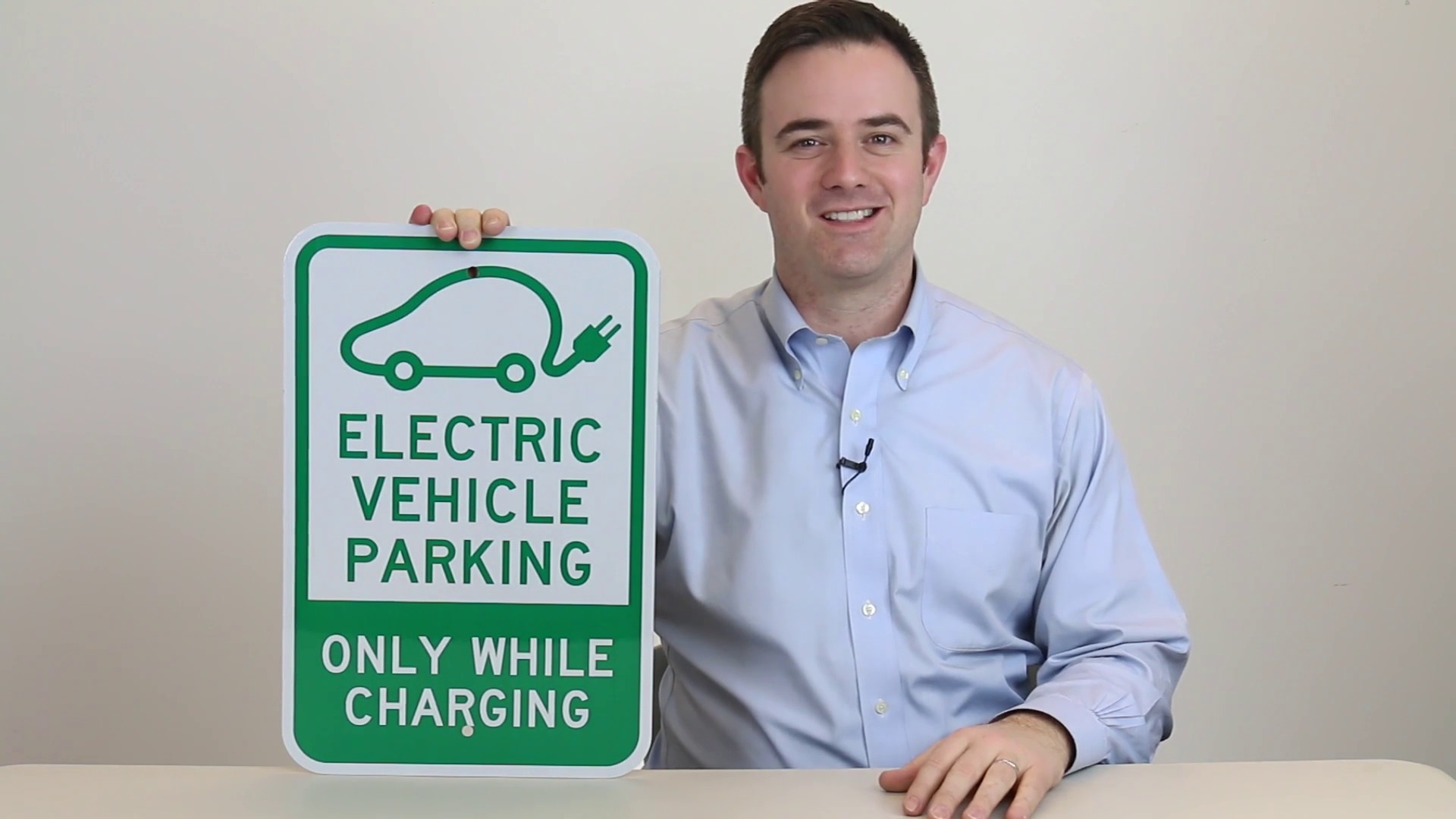 Electric Vehicle Parking Only While Charging Sign