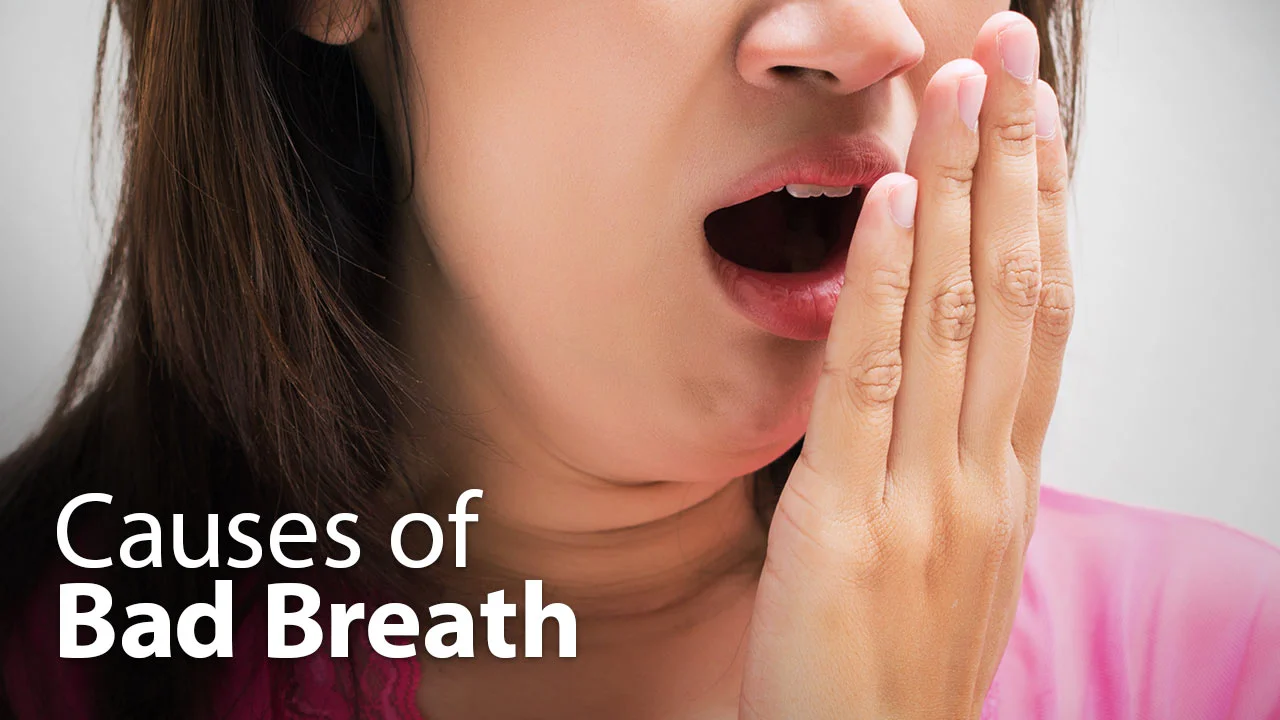 Why Does My Breath Smell? 11 Possible Causes