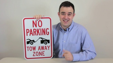 No Parking Tow Zone Sign