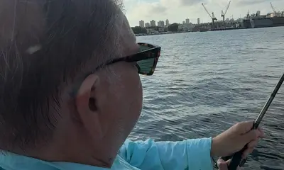 Richard on a hard fighting Aussie salmon