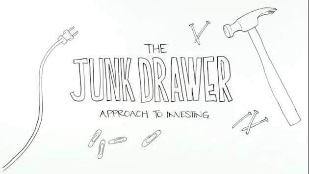 The title is presented in a hand-drawn style in block letters, with JUNK DRAWER in large letters. Also depicted are a claw hammer, paper clips, an electrical cord, and nails.