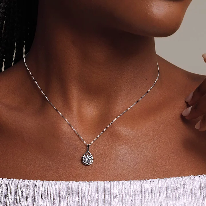 Diamond Twist Pendant (1/2 ct. tw.) in 18K Yellow Gold