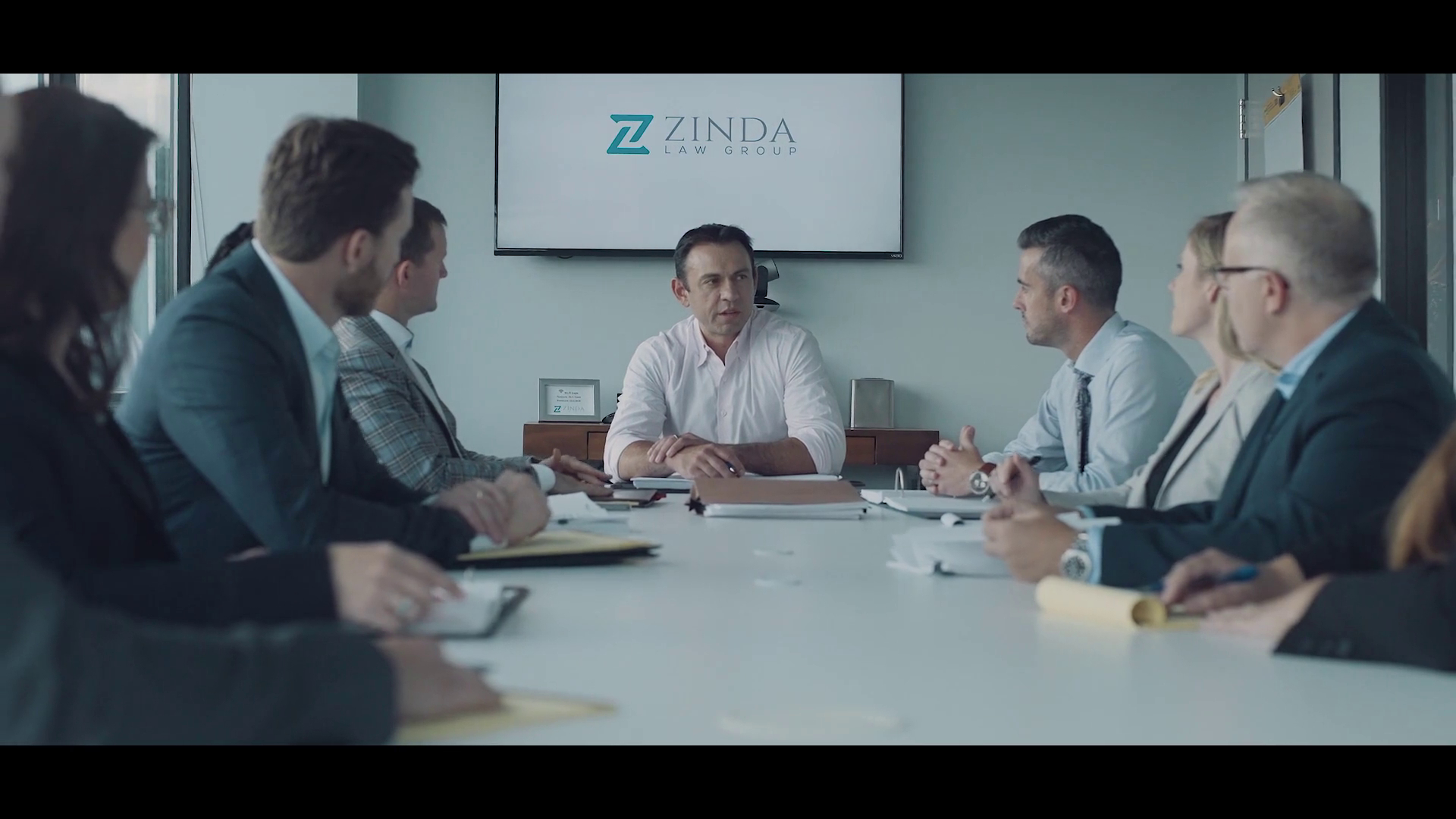 The Zinda Law Group legal team in a case strategy meeting