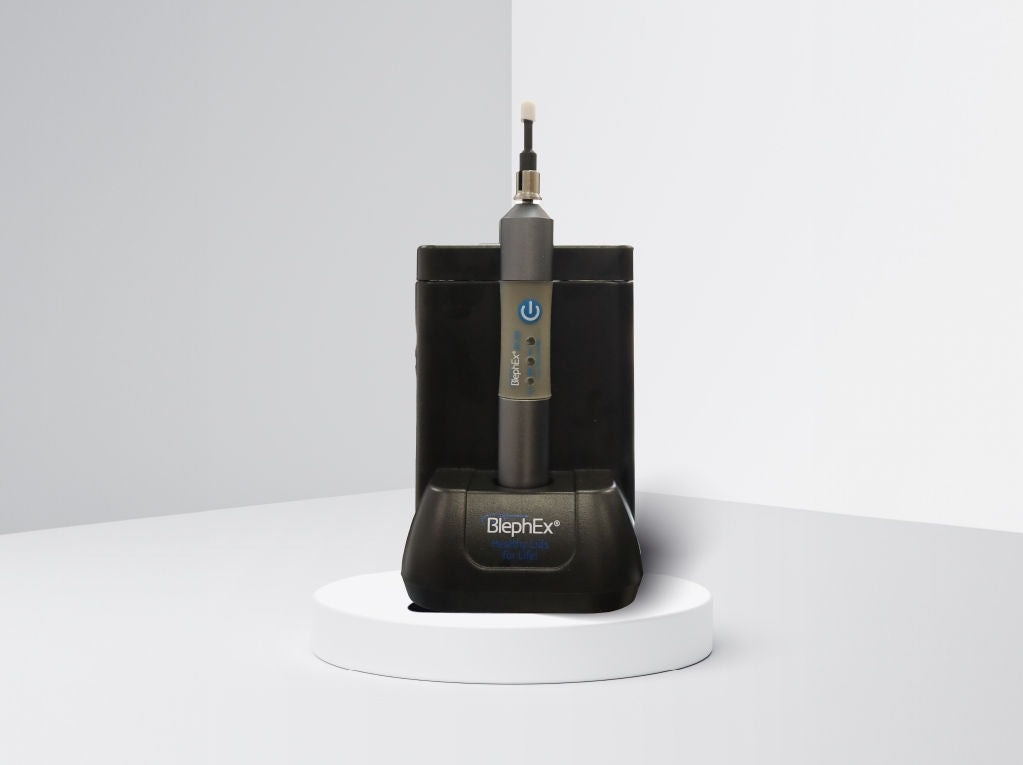 BlephEx handpiece standing in its charging base