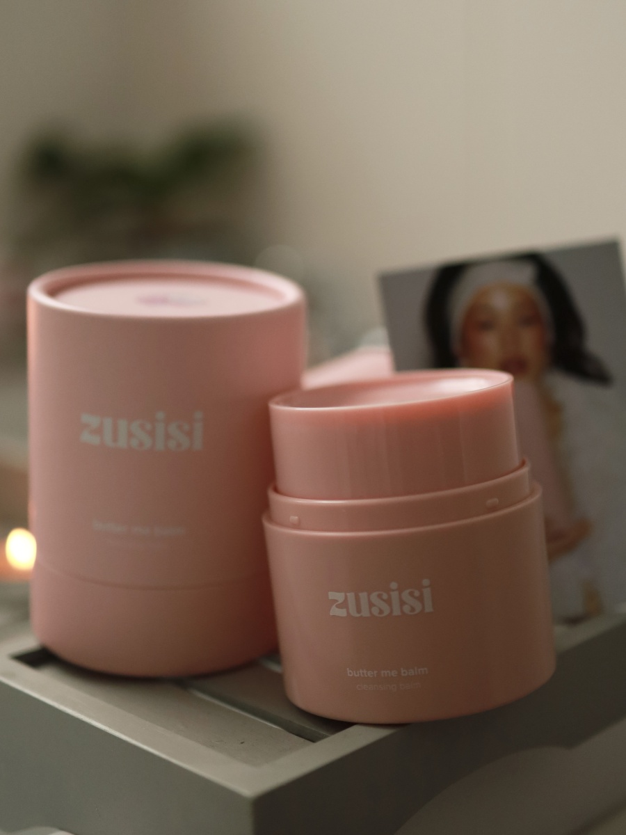 Pink beauty products styled for social media content