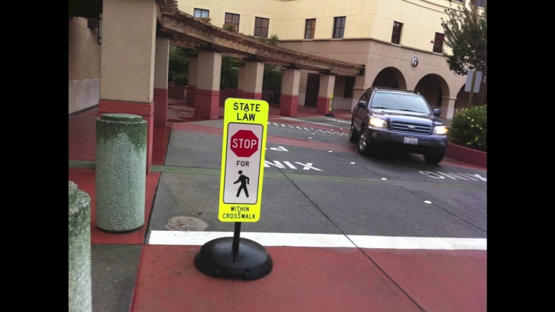 State Law Yield to Pedestrians within Crosswalk Sign
