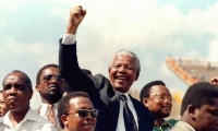 Which factors contributed to the pressure to end apartheid?