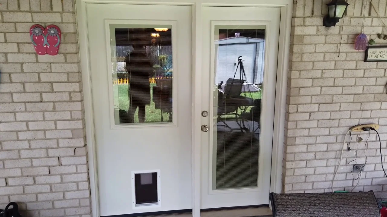 can i put a dog door in a metal door