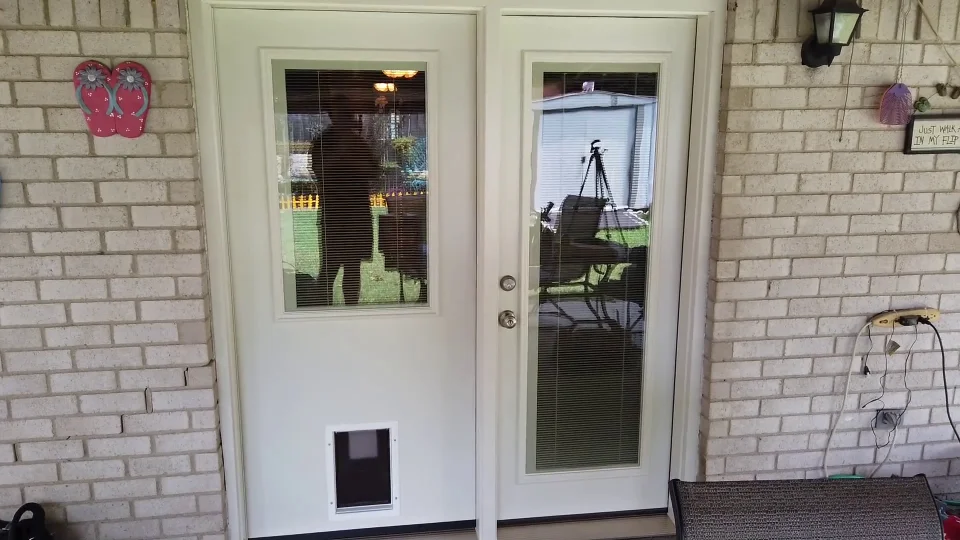 Steel doors with pet best sale door installed