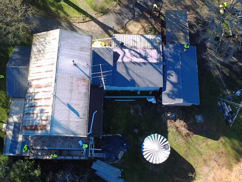 Old patched roof before replacement