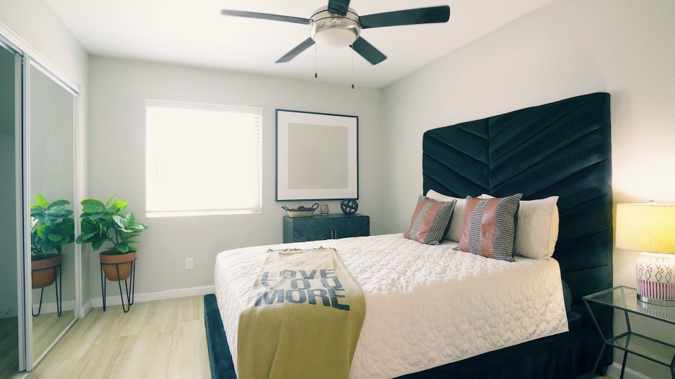 Furnished bedroom shown at The Palmer.
