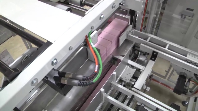 SV241 Offset Inline Automatic 22-12 with Collating Stacker and Shrink Tunnel 22-12-45 - wrapping feminine care boxes in 12 packs