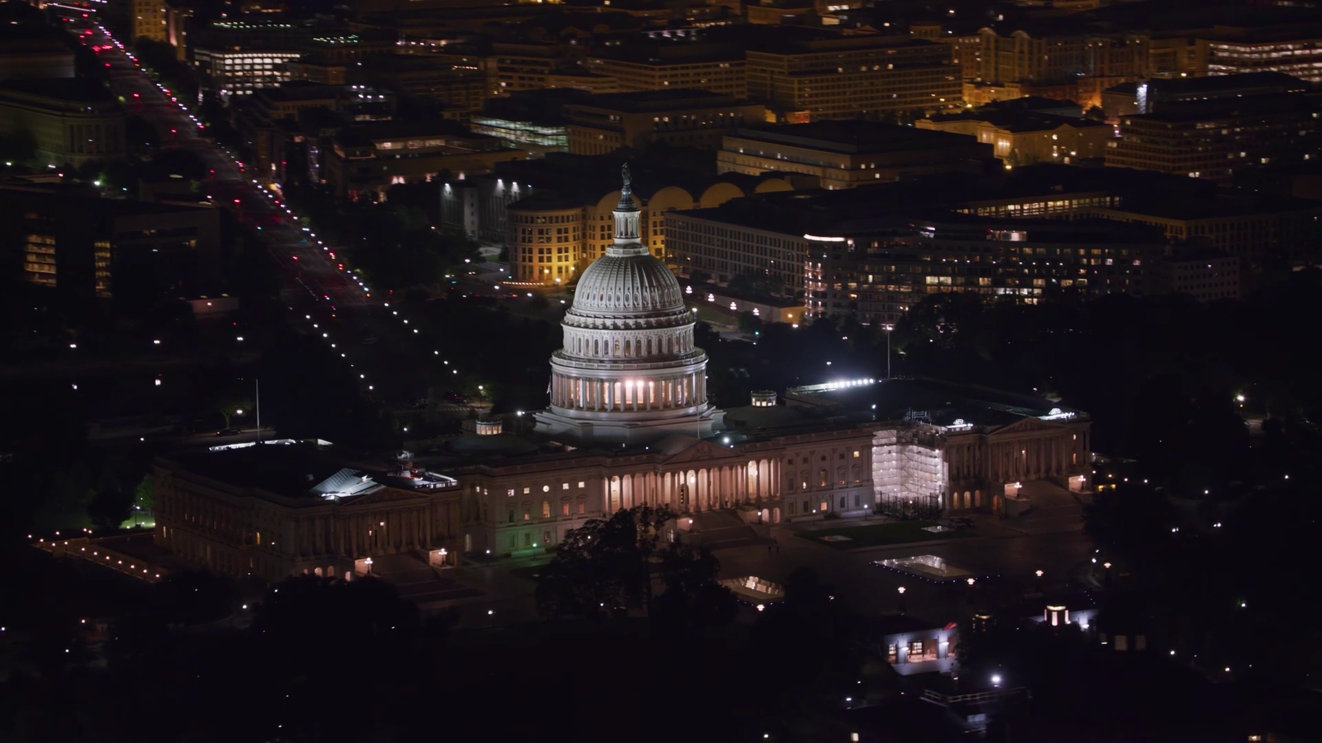 Aerial night view of the illuminated United States Capitol in Washington DC
