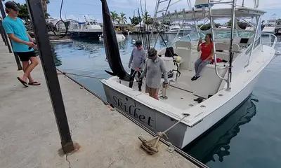 Caught a 230 lb. Marlin - Thanks Captain John