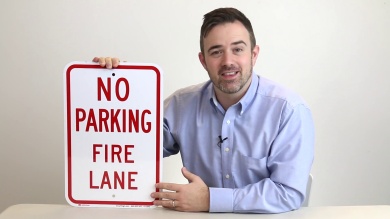 No Parking Fire Lane Sign With Bidirectional Arrow
