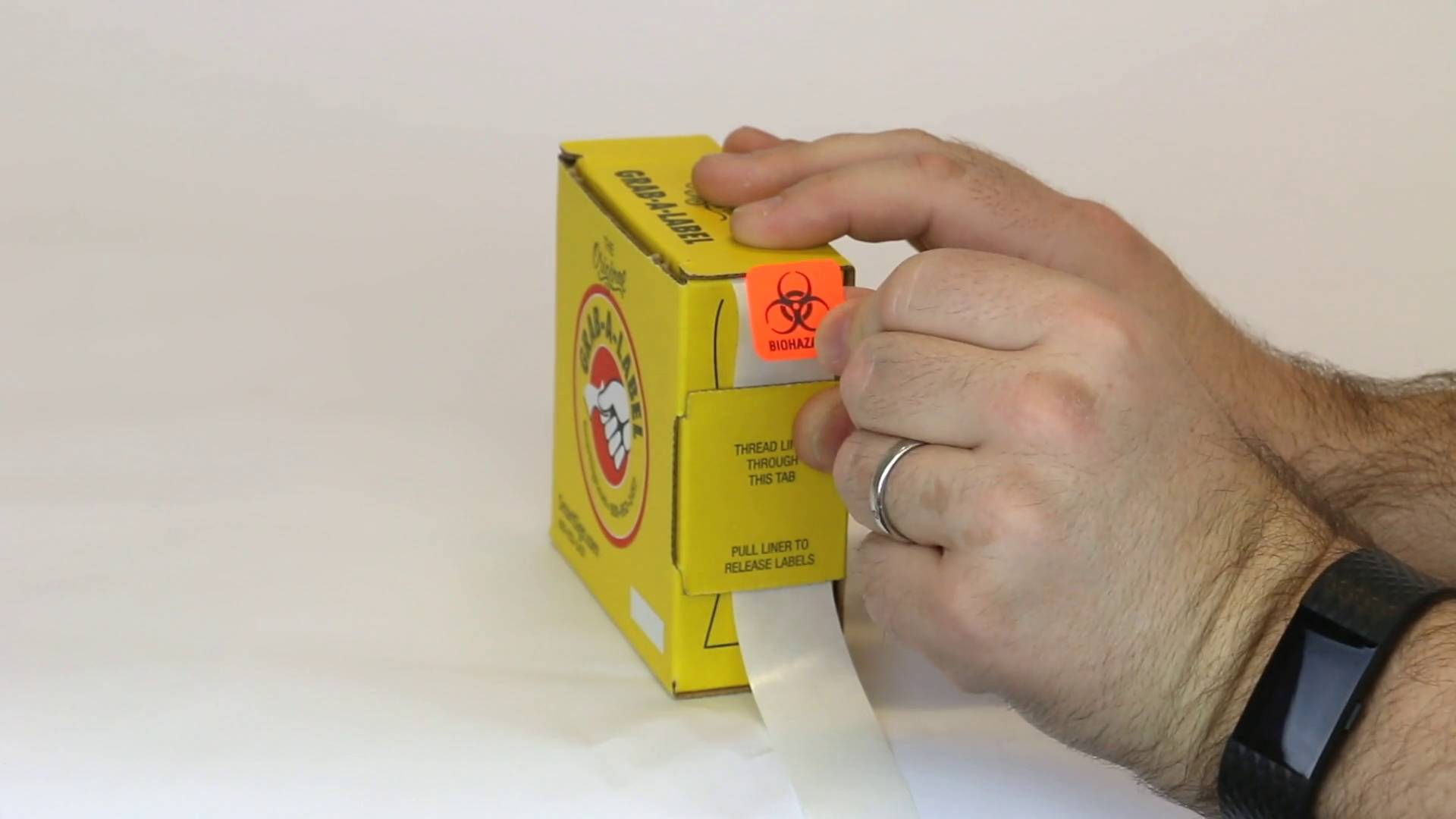 Biohazard Stickers in Dispenser