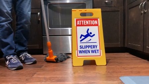 Slippery When Wet / Wet Floor Signs