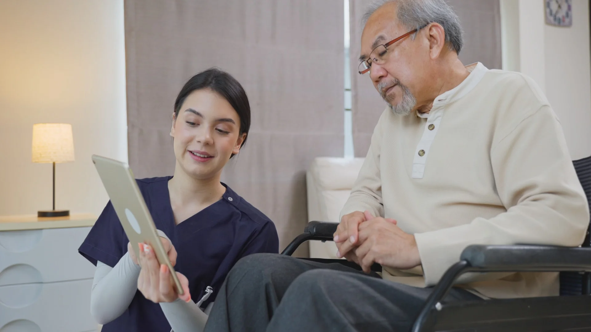 Stock image of a healthcare provider working with an older man.