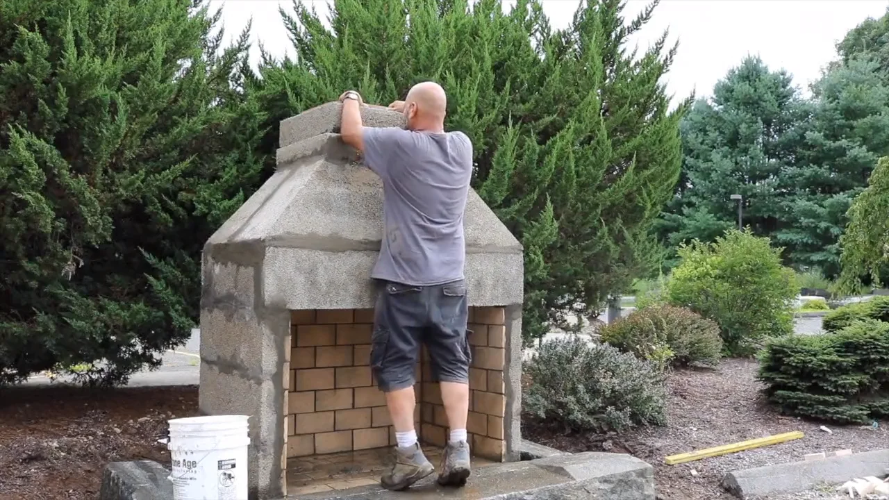 outdoor brick fireplace and grill