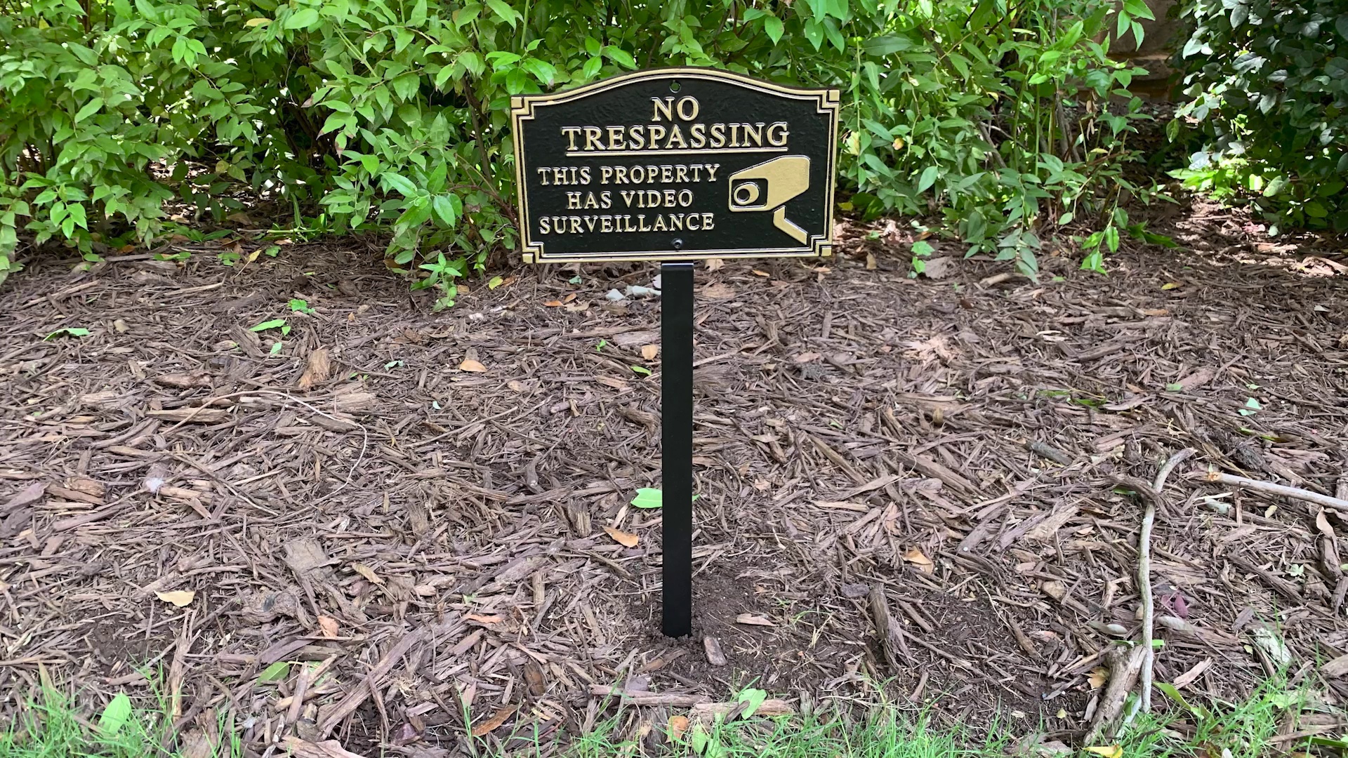 No Trespassing - This Property Has VS GardenBoss Sign
